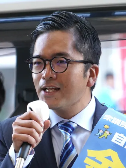 金子容三